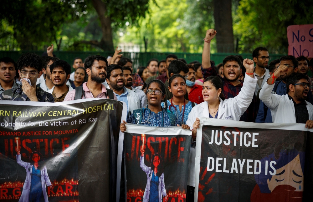 Doctors shout slogans during a protest demanding justice following the rape and murder of a trainee medic at a hospital in Kolkata, in New Delhi, India, August 19, 2024. — Reuters pic