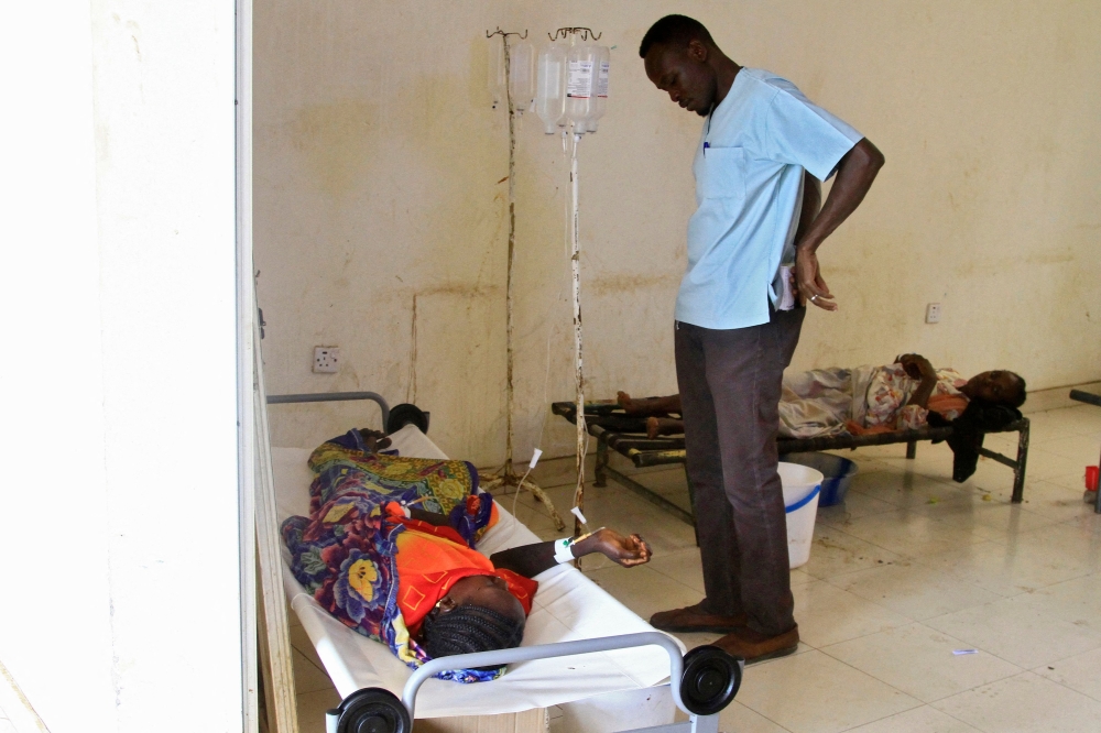 Patients suffering from cholera receive treatment at a rural isolation centre in Wad Al-Hilu in Kassala state in eastern Sudan, on August 17, 2024. Sudan's health minister on August 17 declared a cholera epidemic after weeks of heavy rain in the war-torn country, in a video released by his ministry. — AFP pic