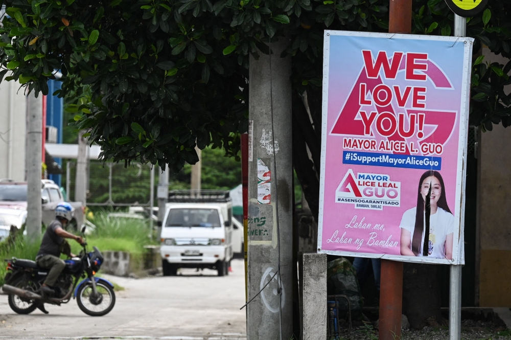 This photo taken on July 19, 2024, shows a poster showing support for then Bamban Mayor Alice Guo in Bamban, Philippines. — AFP pic