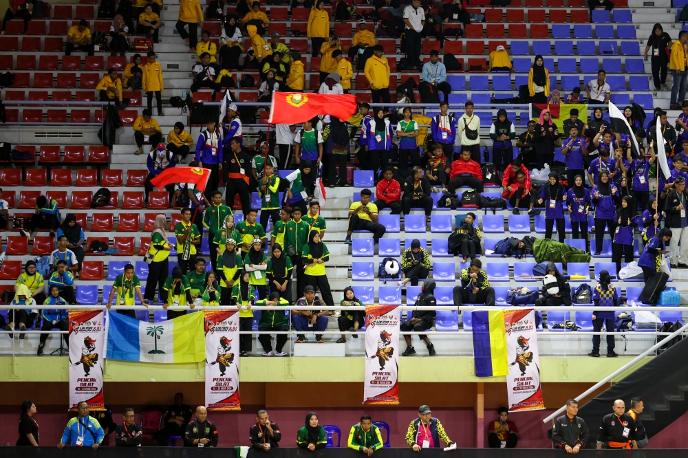Silat teams from different states were separated to avoid any incidents during the silat competition, held without spectators, at the 2024 Malaysia Games (Sukma) at the Miri City Stadium August 22, 2024. — Bernama pic
