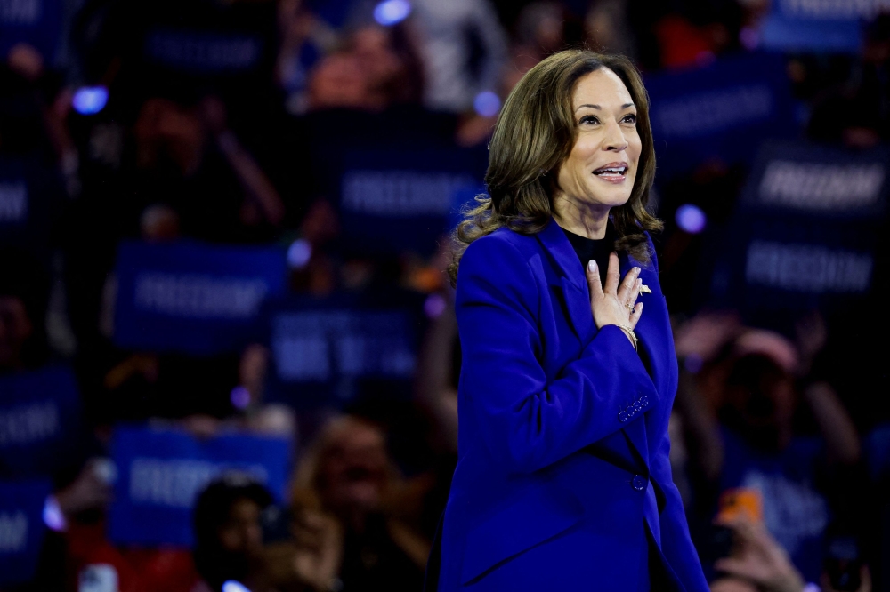 US Vice President and Democratic presidential nominee Kamala Harris reacts as she is filmed for a live broadcast into Chicago’s Democratic National Convention (DNC), after delegates of each state delegation ended the roll call to once again nominate her as presidential nominee, during her rally in Milwaukee, Wisconsin August 20, 2024. — Reuters pic  