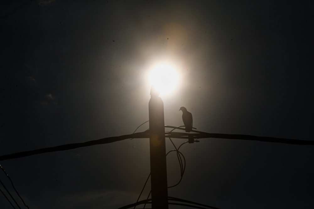  An ongoing heatwave in Asia is likely to keep gas consumption in the region strong, while the risk of price volatility remains due to geopolitical tensions in Europe and the Middle East, said Rystad Energy today. — Picture by Farhan Najib