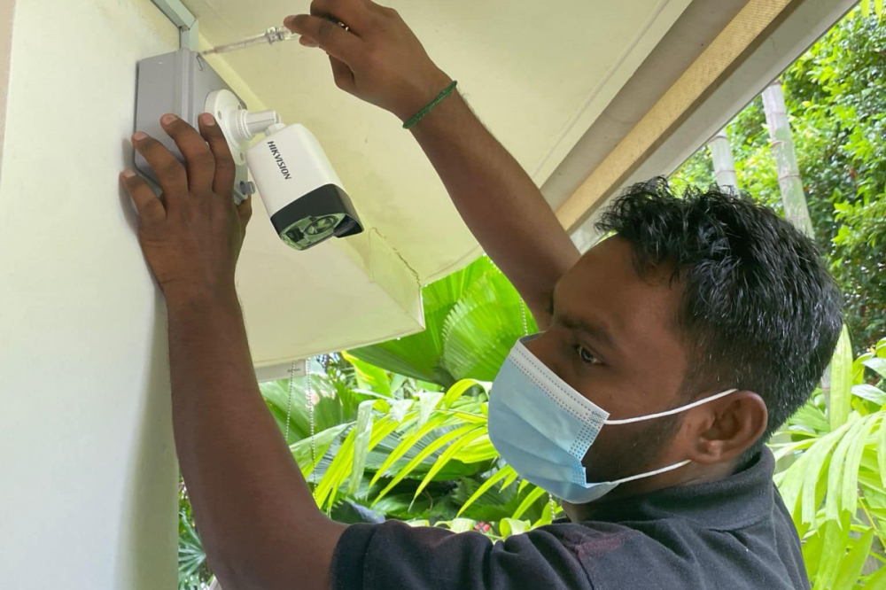 Residents in Singapore's landed neighbourhoods are investing in burglar alarms and closed-circuit TV following a spate of break-in cases. — Picture from Facebook/I-Secure Solution