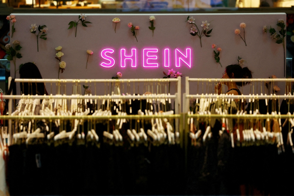 Shein said in the report yesterday it had suspended orders from the suppliers that had employed children under 16. — Reuters pic