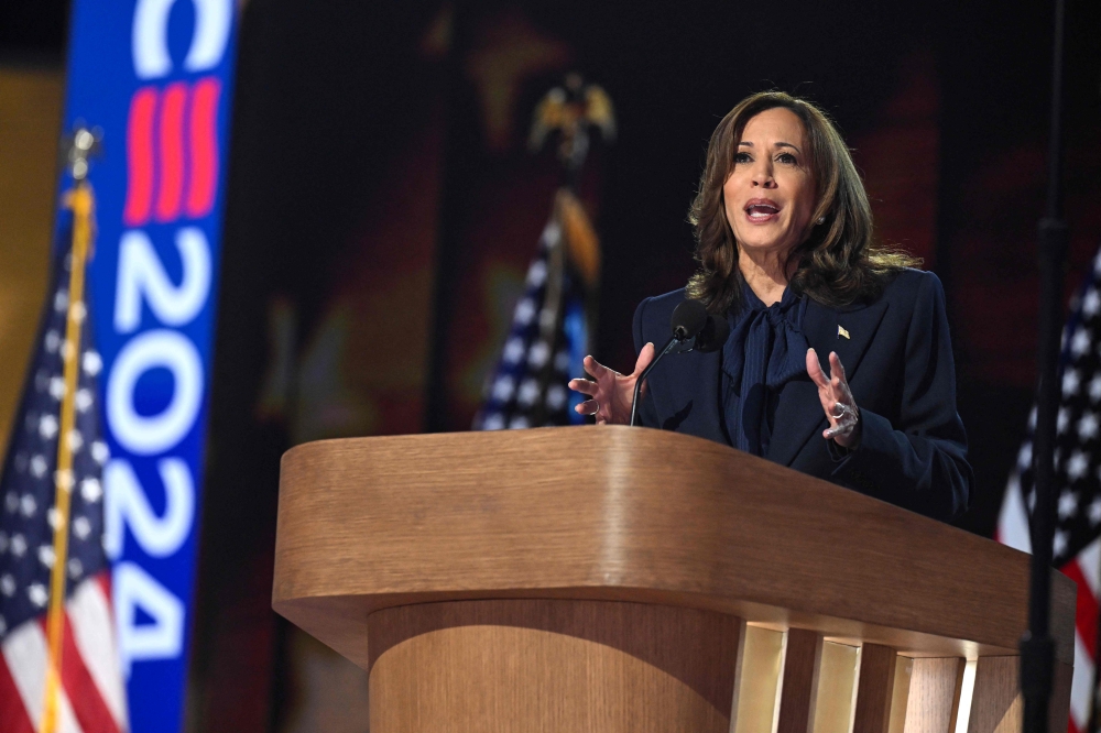 US Vice President and 2024 Democratic presidential candidate Kamala Harris speaks on the fourth and last day of the Democratic National Convention (DNC) at the United Center in Chicago, Illinois, on August 22, 2024.  — AFP pic