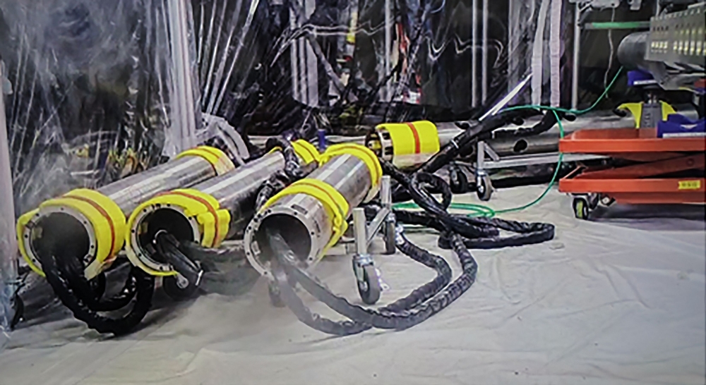 This handout photo taken on August 22, 2024 shows pipes for the installation of a telescopic device to be used for the removal of radioactive debris in Fukushima reactor. — AFP pic