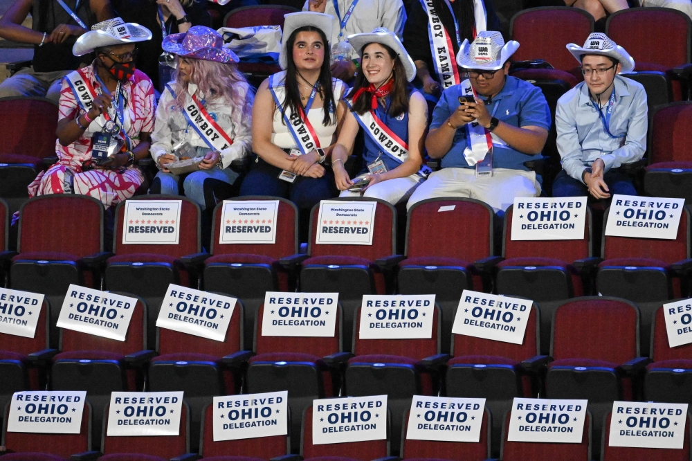 Delegates and attendees wear cowboy hats on the first day of the Democratic National Convention (DNC) at the United Center in Chicago, Illinois, on August 19, 2024. — AFP pic