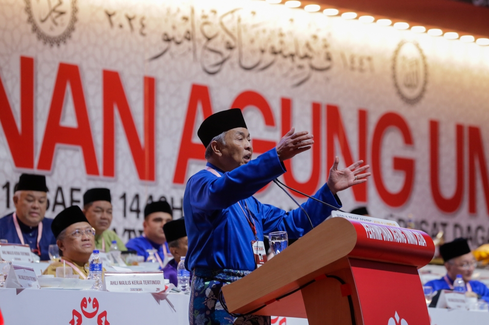 Umno president Datuk Seri Ahmad Zahid Hamidi delivers his closing speech during the 2024 Umno General Assembly at the World Trade Centre Kuala Lumpur on August 24, 2024. — Picture by Raymond Manuel