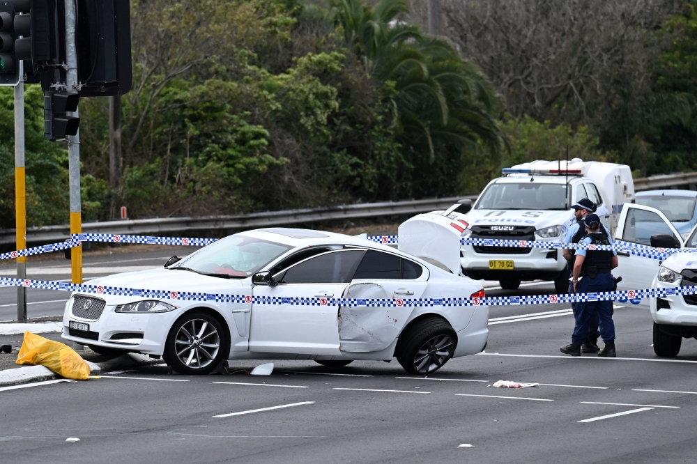 A damaged vehicle is cordoned off by the police after a two-vehicle crash in Engadine, Sydney, Australia August 25, 2024. — Reuters pic
