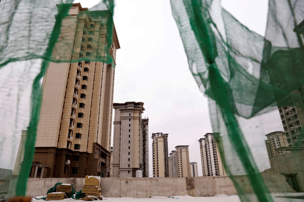 A view of unfinished residential buildings developed by China Evergrande Group in the outskirts of Shijiazhuang, Hebei province February 1, 2024. — Reuters pic  