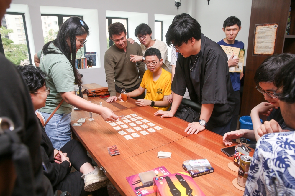 There are tabletop games cafes designed for enthusiasts and newcomers alike. — Picture by Choo Choy May
