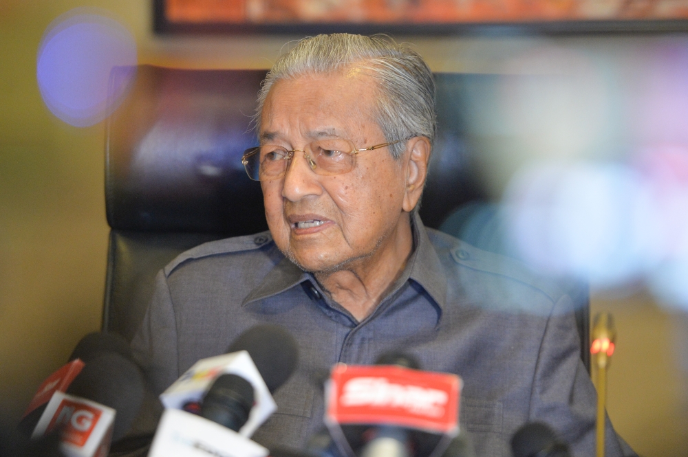Former prime minister Tun Dr Mahathir Mohammad says no one has ever called him as ‘Mahathir anak lelaki Iskandar Kutty’. — Picture by Miera Zulyana