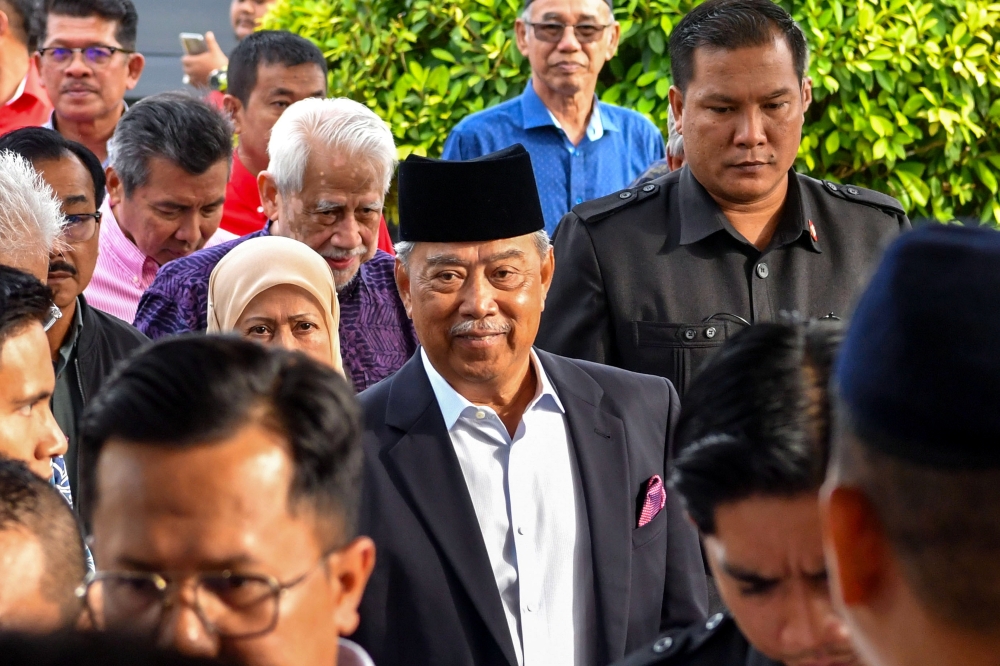 Former prime minister Tan Sri Muhyiddin Yassin arrives at the Sessions Court in Gua Musang, Kelantan to face a sedition charge. — Bernama pic