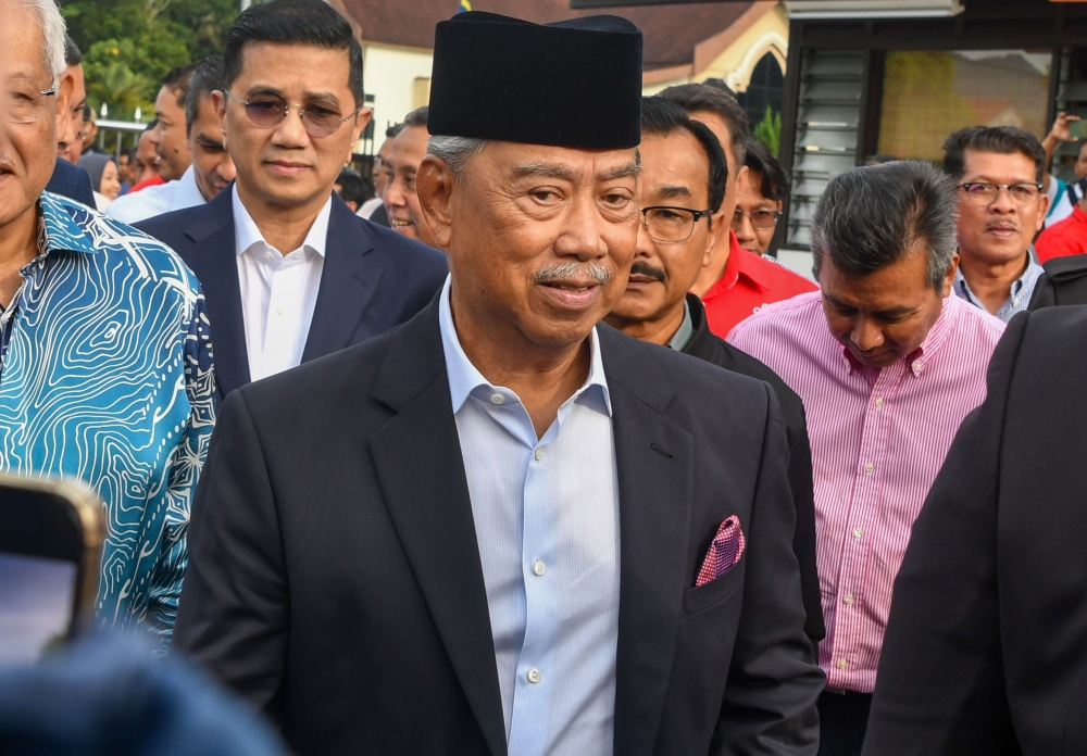 Former prime minister Tan Sri Muhyiddin Yassin arrives at the Sessions Court in Gua Musang, Kelantan to face a sedition charge. — Bernama pic