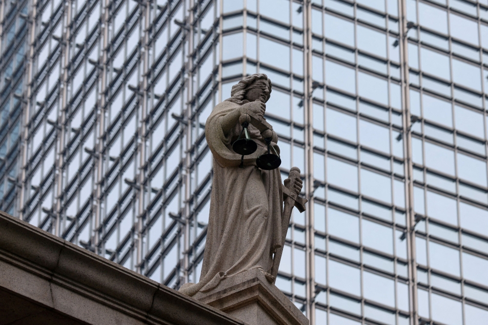 A file photograph shows a statue representing justice, outside Hong Kong’s Court of Final Appeal. — Reuters pic