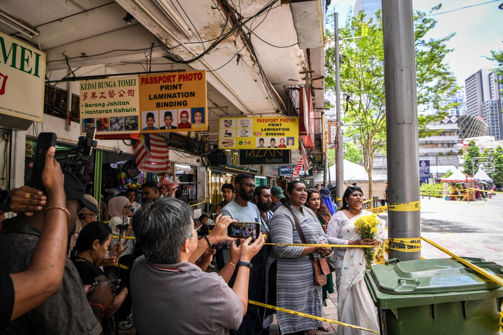 A group from Malaysia Hindu Sanggam and Hindu Darma Mamandram perform religious rites at the site of the sinkhole incident at Jalan Masjid India, Kuala Lumpur August 28, 2024. — Bernama pic