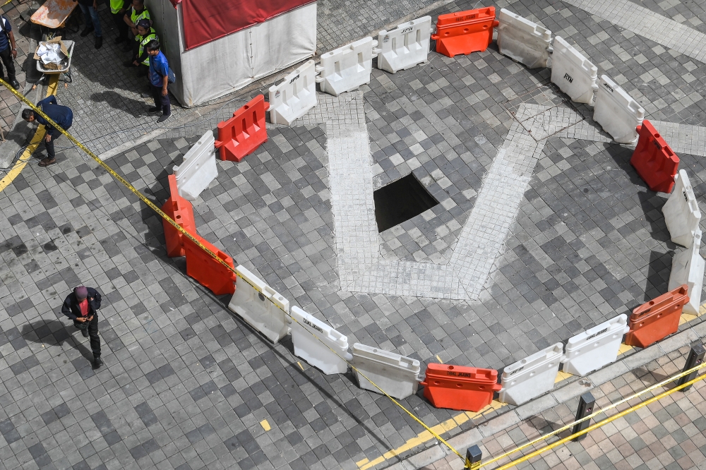 A general view at the another sinkhole at Jalan Masjid India about 50 meter from where the ground suddenly collapsed in Kuala Lumpur August 28, 2024. — FPicture by Yusof Mat Isa