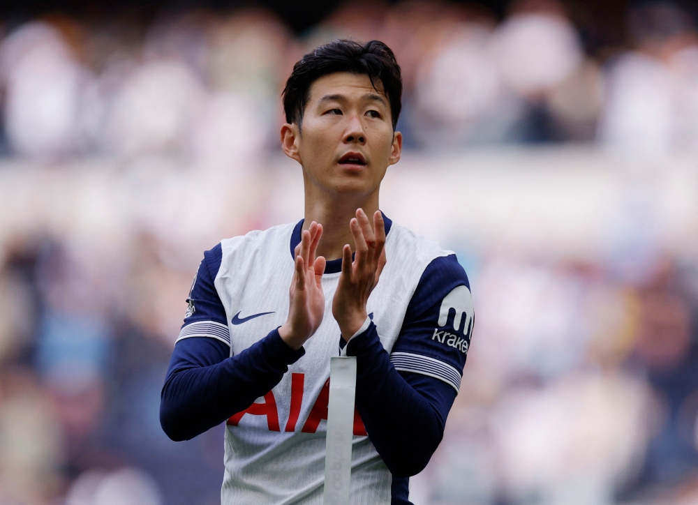 Tottenham Hotspur’s Son Heung-min applauds their fans after the match against Everton in London, August 24, 2024. Son Woong-jung is a public figure in South Korea and authored a best-selling memoir detailing how he helped his son become one of the best strikers in the English Premier League. — Action Images pic via Reuters 
