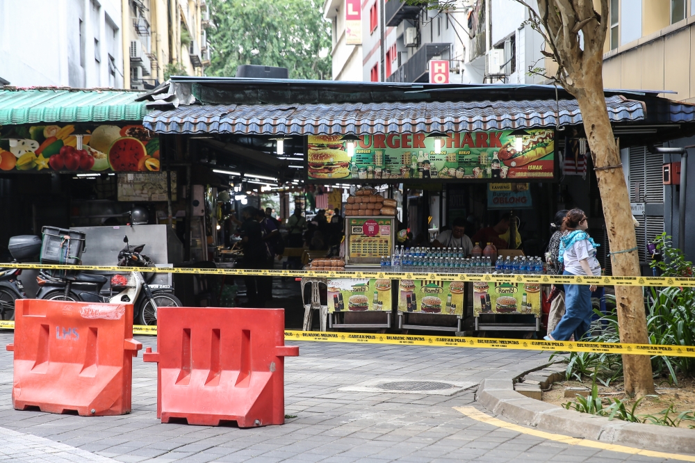 Security tape is seen along Jalan Masjid India in Kuala Lumpur on August 29, 2024. — Picture by Yusof Mat Isa