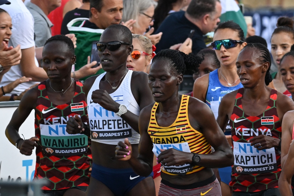 Uganda’s Rebecca Cheptegei (second from right) competing in the women’s marathon final during the World Athletics Championships in Budapest on August 26, 2023. — AFP pic