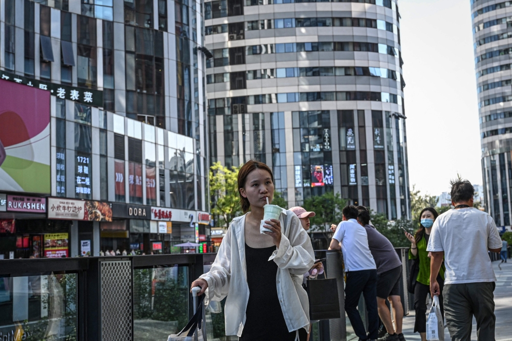The consumer confidence index for China, the world’s second-largest economy, dropped to 86 in July, a slight decrease from 86.2 in June, according to a report published in South China Morning Post today. — AFP pic  