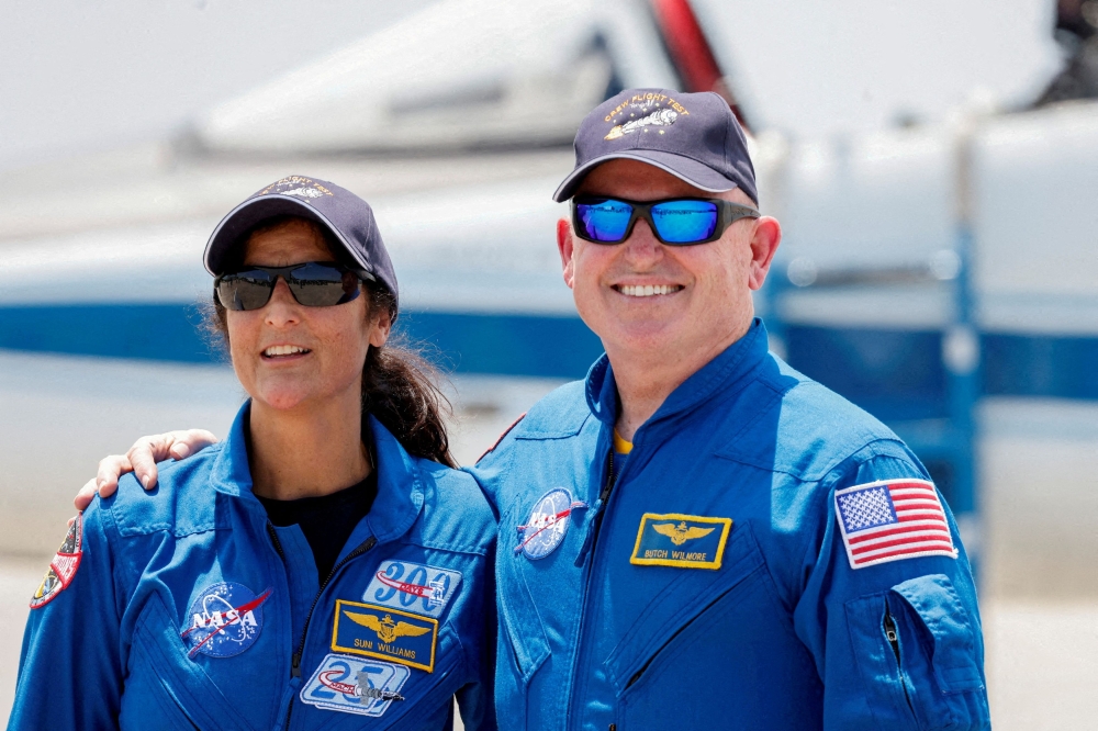 Nasa astronauts Butch Wilmore and Suni Williams pose ahead of the launch of Boeing's Starliner-1 Crew Flight Test (CFT), in Cape Canaveral, Florida, U.S., April 25, 2024. — Reuters pic