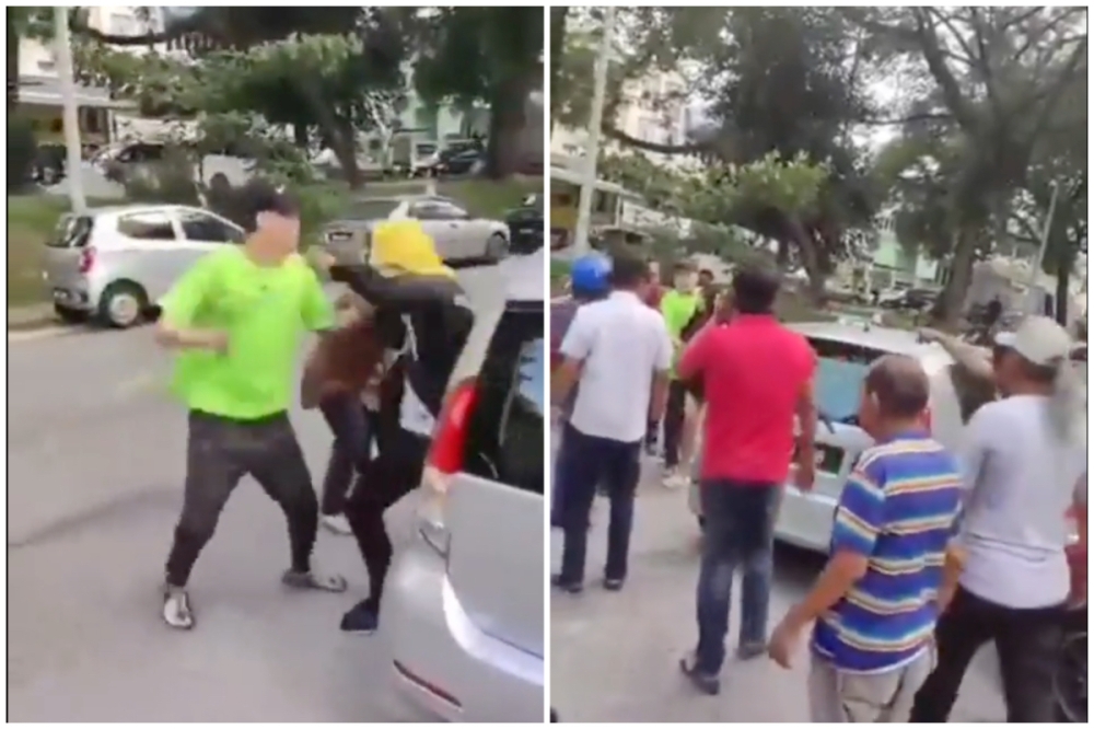 A screengrab of the video that went viral showing two men fighting, with the victim later seen sitting down in pain due to the injuries sustained. 