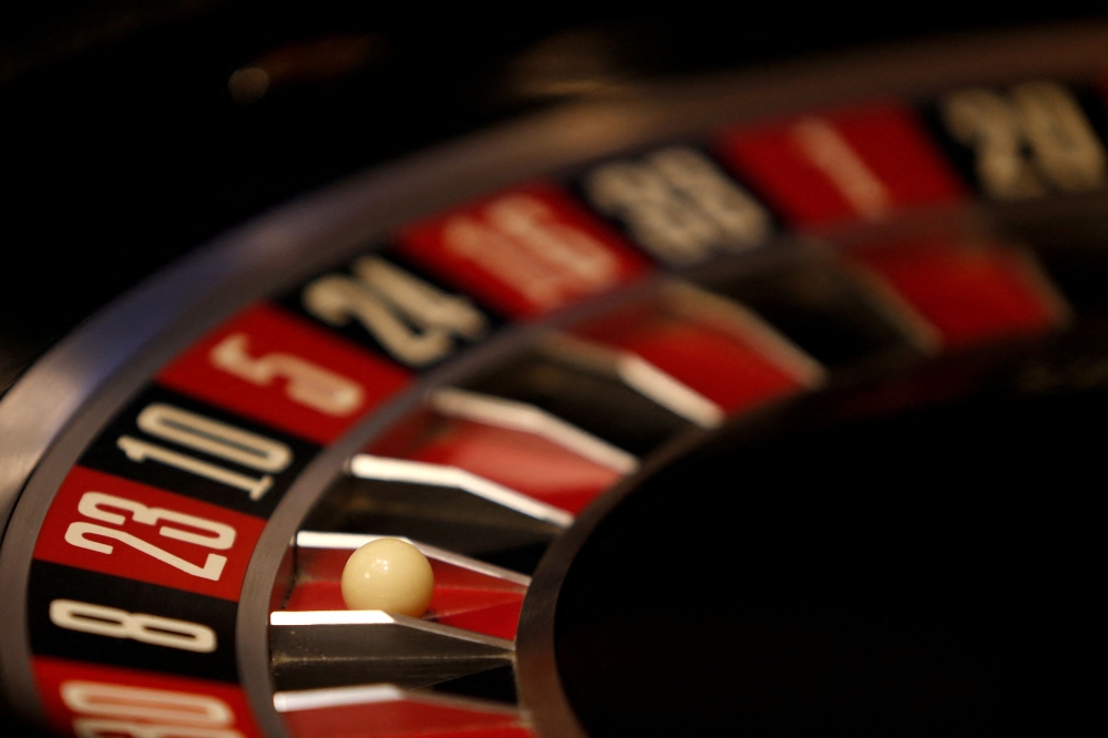 File picture of a spinning wheel on a Roulette table at the Dragonara Casino in St Julian’s, Malta April 11, 2018. The conclusion of a public hearing conducted online over a bill to establish a ‘mega entertainment complex’ housing a casino showed 80 per cent of participants agreed with the plan, Deputy Finance Minister Julapun Amornvivat said. — Reuters pic 