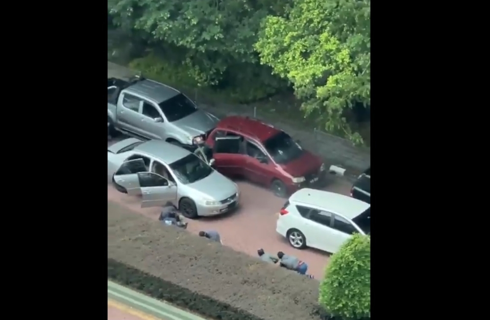 A screengrab from social media of the shootout that took place at Jalan PJS 9/1 Subang Jaya, Selangor on August 20. — Screengrab from social media