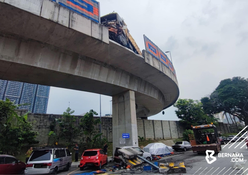 The highway barrier crushed the right side of the Perodua Kenari car, parked near Sekolah Rendah Agama Ibnu Hajar Al Asqalani in Taman Dato’ Senu, Kuala Lumpur on September 6, 2024. — Bernama pic