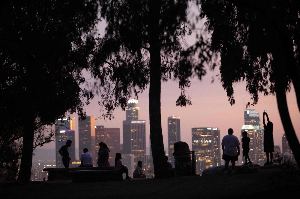 Two animal lovers who stopped on a US freeway in Los Angeles to rescue a stranded kitten caused a three-vehicle crash. — AFP