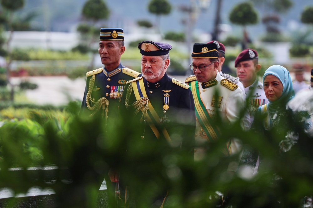 His Majesty Sultan Ibrahim, King of Malaysia and Her Majesty Raja Zarith Sofiah, Queen of Malaysia, arrive at the grounds of the National Palace for the Federal Awards and Decorations Ceremony 2024, September 7, 2024. With him is Prime Minister Datuk Seri Anwar Ibrahim. — Bernama pic 