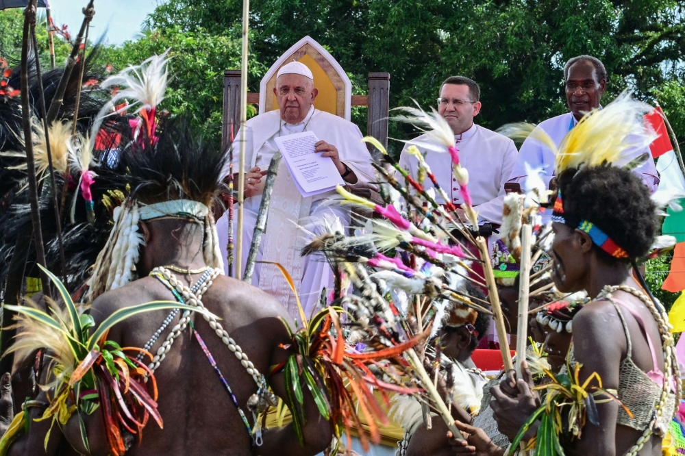 Pope Francis attends a meeting with Catholicsof the diocese of Vanimo in front of Holy Cross Cathedral in Vanimo, Papua New Guinea on September 8, 2024. — AFP pic