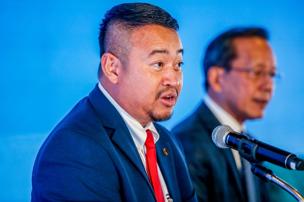 MAG Chief Executive Officer, Airlines Business, Ahmad Luqman Mohd Azmi speak to the media at the MAG new global partnership agreement at MITEC in Kuala Lumpur on March 22, 2024. — Picture by Hari Anggara.