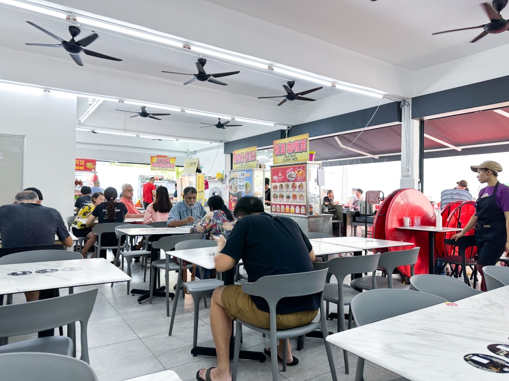 As it's a corner lot, the coffee shop is airy and pleasant to dine in  — Picture by Lee Khang Yi