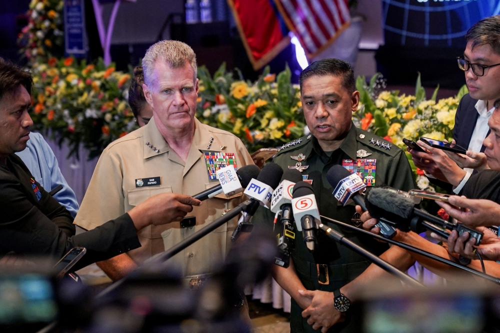 A file photo showing US Indo-Pacific Command Admiral Samuel Paparo (left) and Philippine Army Chief of Staff Romeo Brawner Jr in Manila, the Philippines on August 27, 2024. — Reuters pic