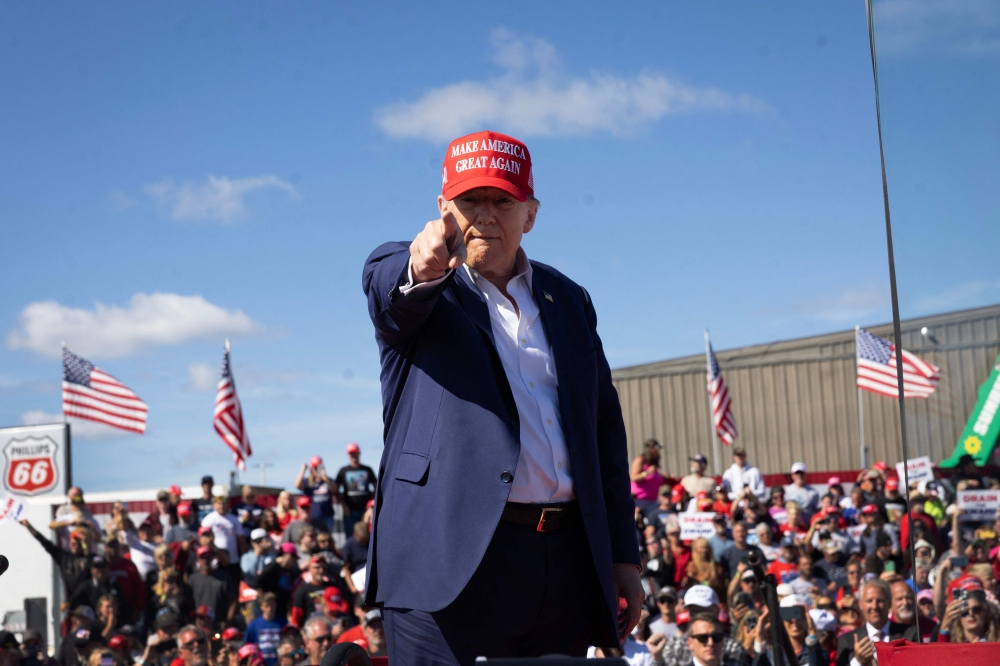 Former US president Donald Trump departs a campaign event at the Central Wisconsin Airport on September 07, 2024 in Mosinee, Wisconsin. — AFP pic