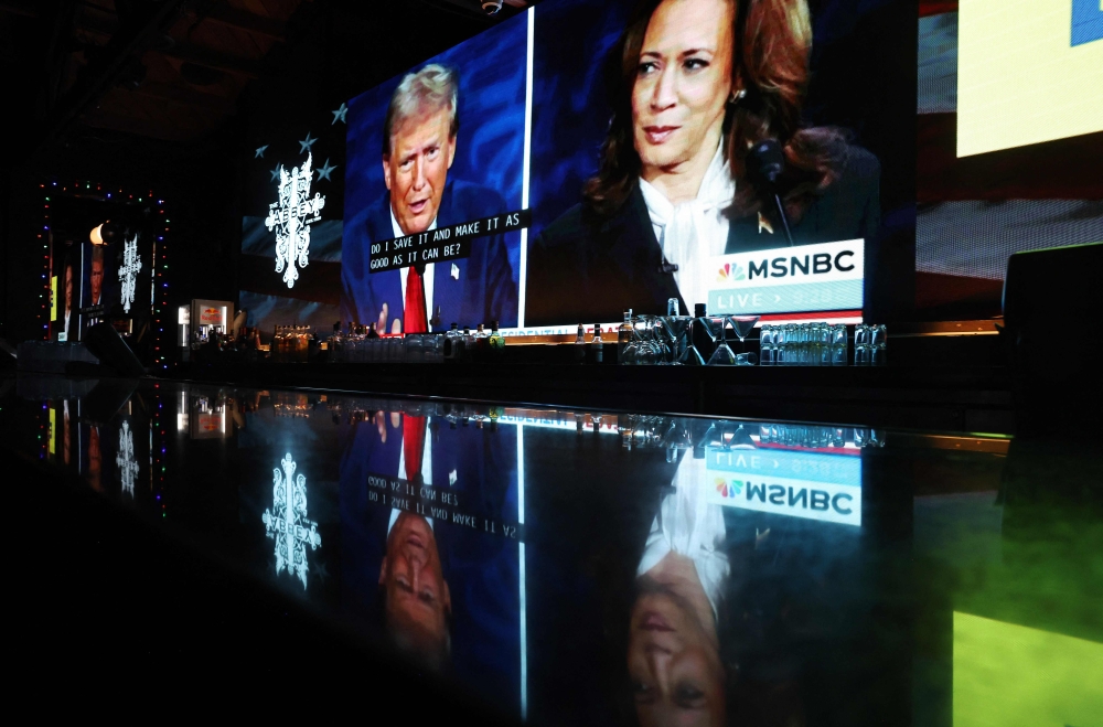 The ABC News presidential debate between Democratic presidential nominee, U.S. Vice President Kamala Harris and Republican presidential nominee, former U.S. President Donald Trump is shown at a debate watch party at The Abbey, an iconic gay bar, on September 10, 2024 in West Hollywood, California. — AFP pic