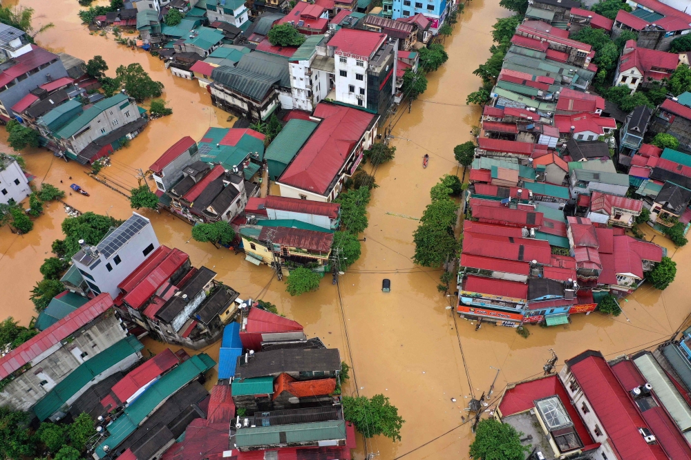 This aerial picture shows flooded streets in Yen Bai on September 10, 2024, in the aftermath of Typhoon Yagi hitting northern Vietnam. — AFP pic