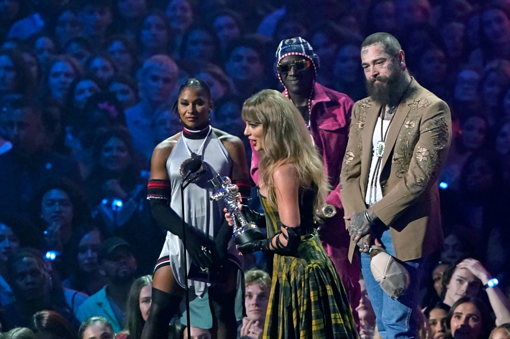 Singer-songwriter Taylor Swift and rapper Post Malone accept the Best Collaboration award for ‘Fortnight’ on stage during the MTV Video Music Awards at UBS Arena in Elmont, New York, on September 11, 2024. — AFP pic 