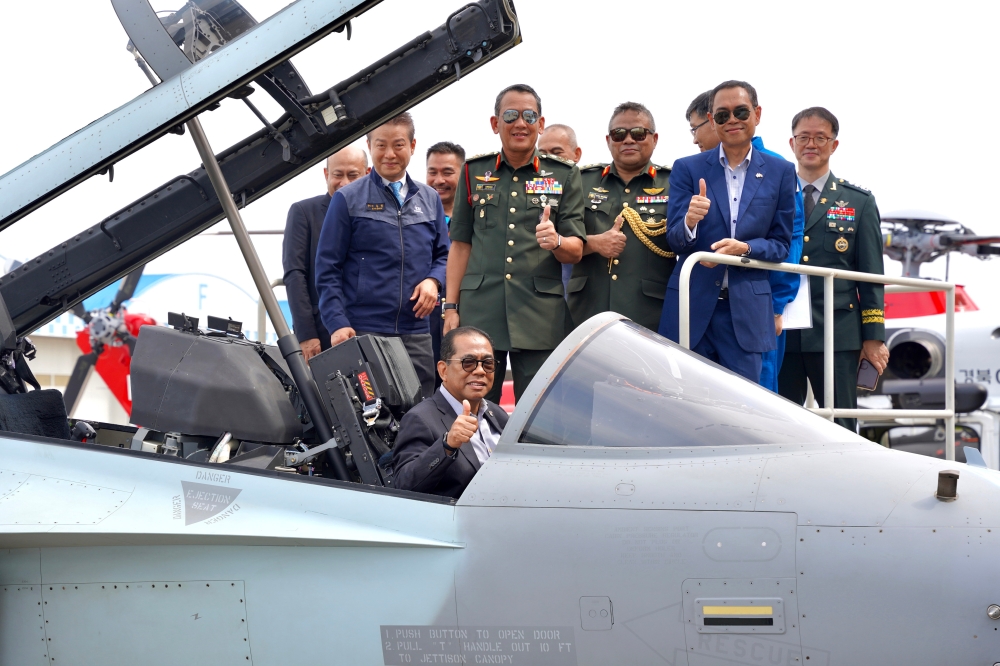 Defence Minister Datuk Seri Mohamed Khaled Nordin sits in the cockpit of an FA-50 jet fighter during his visit to Korean Aerospace Industry (KAI) in Jinju, South Korea September 13, 2024. — Bernama pic