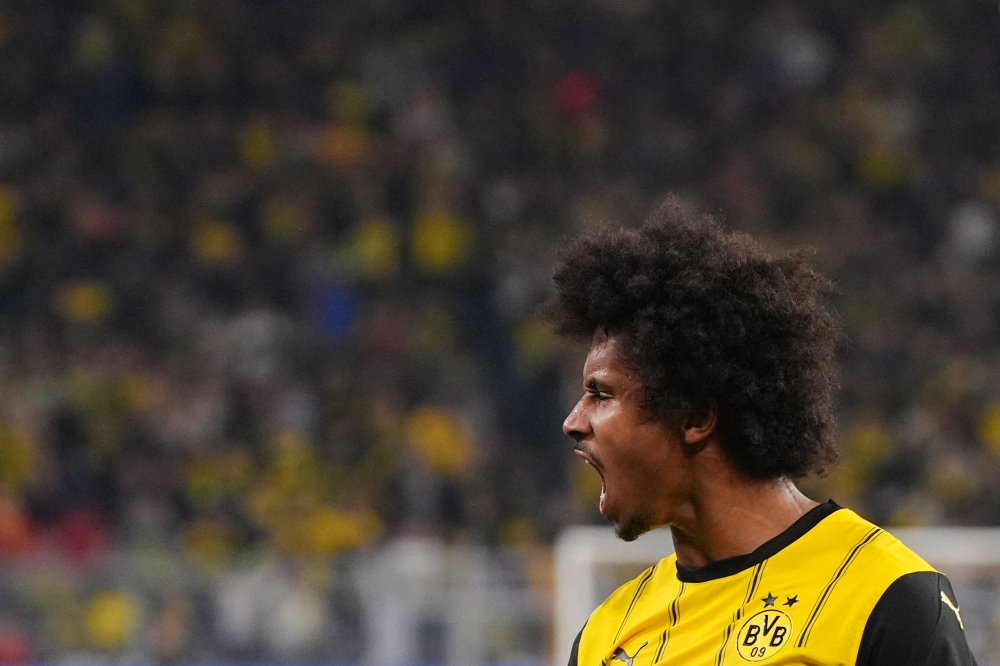 Dortmund’s Karim Adeyemi celebrates his 3-0 during the Bundesliga match between Borussia Dortmund and Heidenheim in Dortmund September 13, 2024. — AFP pic