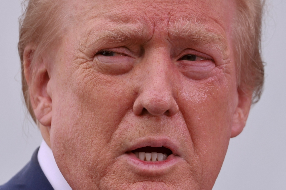 Republican presidential nominee and former US President Donald Trump attends a press conference at Trump National Golf Club, in Rancho Palos Verdes, September 13, 2024. — Reuters pic