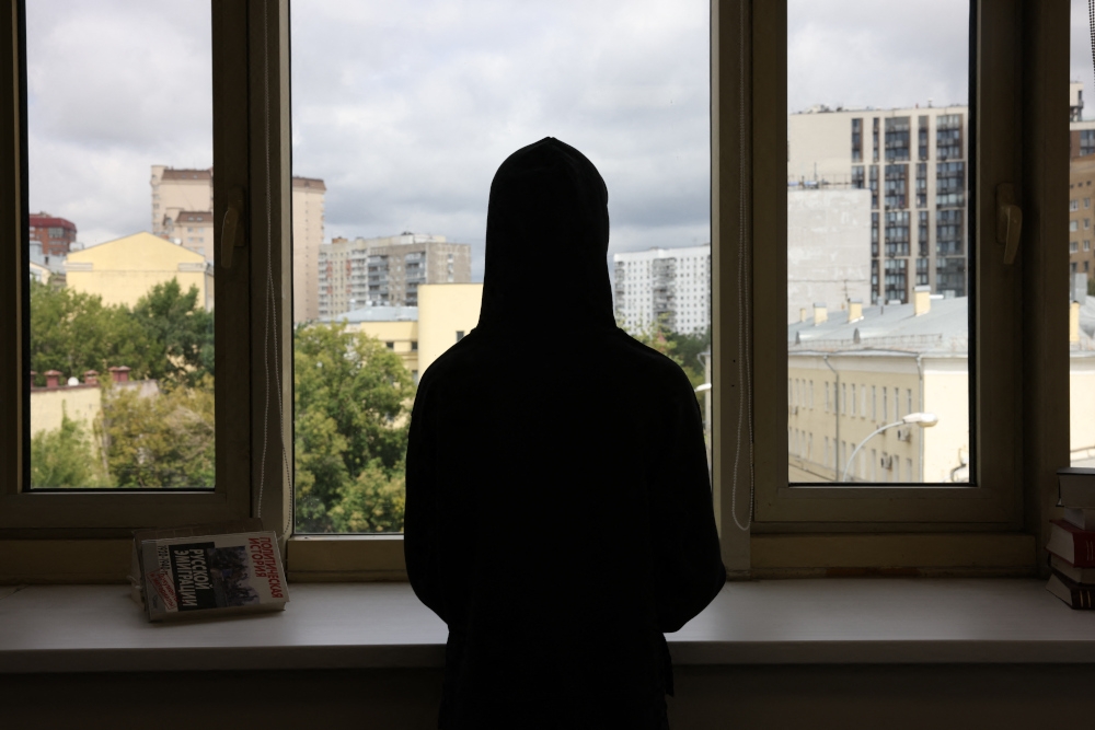 Maria, the 47-year-old English professor at a Moscow university who asked for her surname to be withheld, poses during an interview with AFP in Moscow on August 2, 2024. — AFP pic 