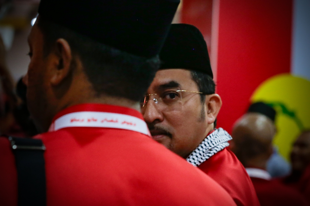 Umno secretary-general Datuk Asyraf Wajdi Dusuki attends the opening ceremony of the 2024 Umno General Assembly at the World Trade Centre Kuala Lumpur August 23, 2024. — Picture by Raymond Manuel