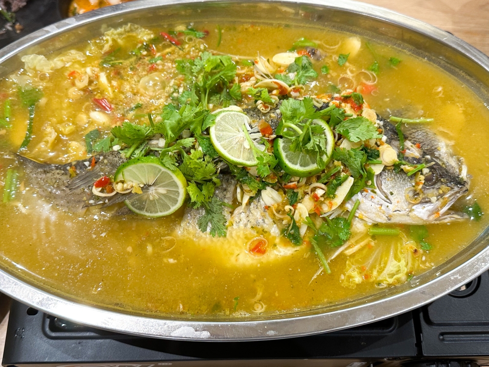 Siakap Fish in Lime Sauce isn't your ordinary steamed fish, it's one with a zesty soup that you will want to drink every drop of. — All pictures by Lee Khang Yi