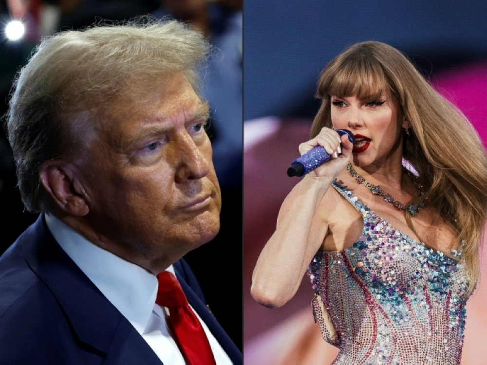 Swifties For Kamala raised RM172,000 for the presidential hopeful's campaign after Trump took a swipe at Swift.  — AFP pic