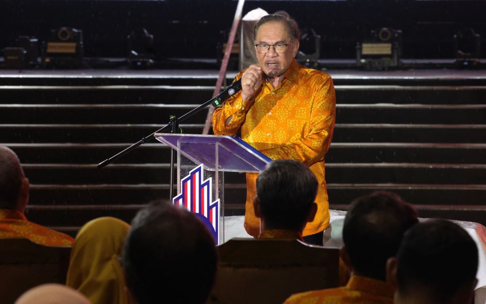 Prime Minister Datuk Seri Anwar Ibrahim delivering his address at the Malaysia Day 2024 celebration in Padang Merdeka, Kota Kinabalu, September 16, 2024. — Bernama pic