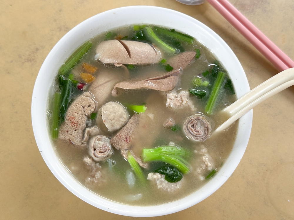 Probably one of the better bowls of pork noodles I have tasted in Petaling Jaya with its well cooked offal in a broth that one will happily drink to the last drop. — Picture by Lee Khang Yi