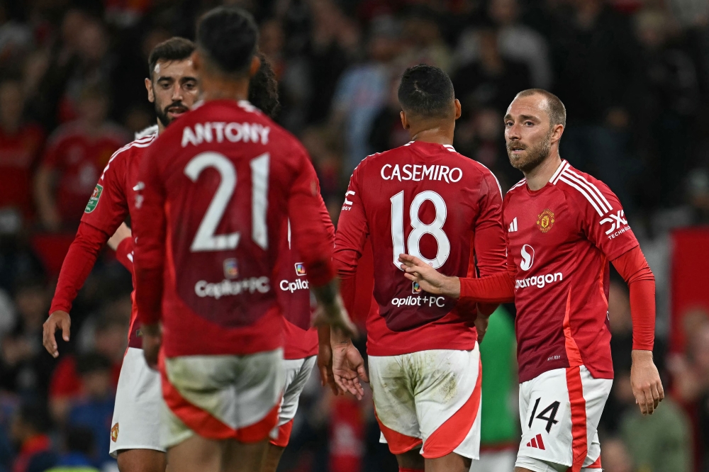 Christian Eriksen will wait to settle his Manchester United future after speculation that the Denmark midfielder could leave Old Trafford. — AFP pic